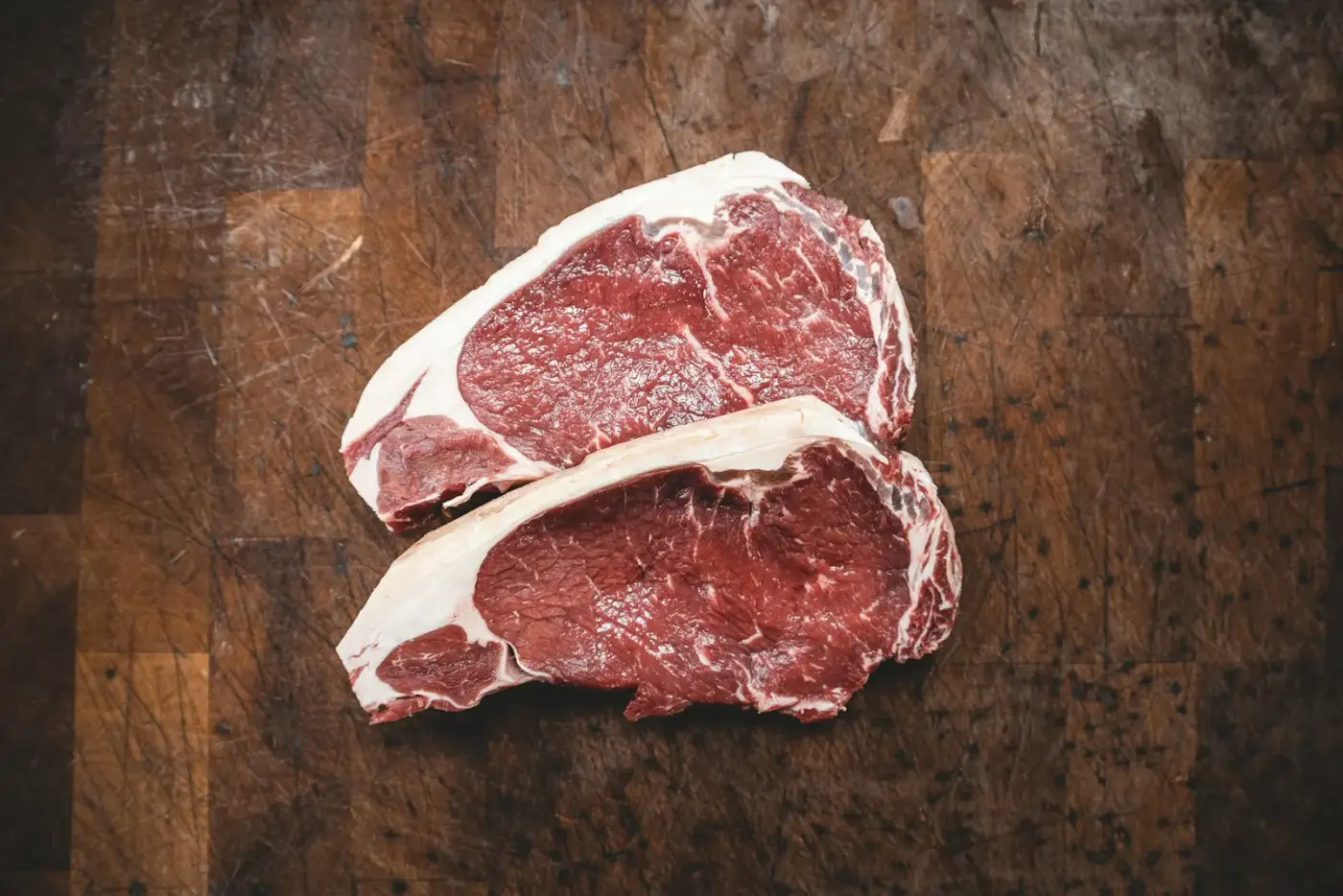 LongHorn Fire-Grilled T-Bone steak on a dinner plate