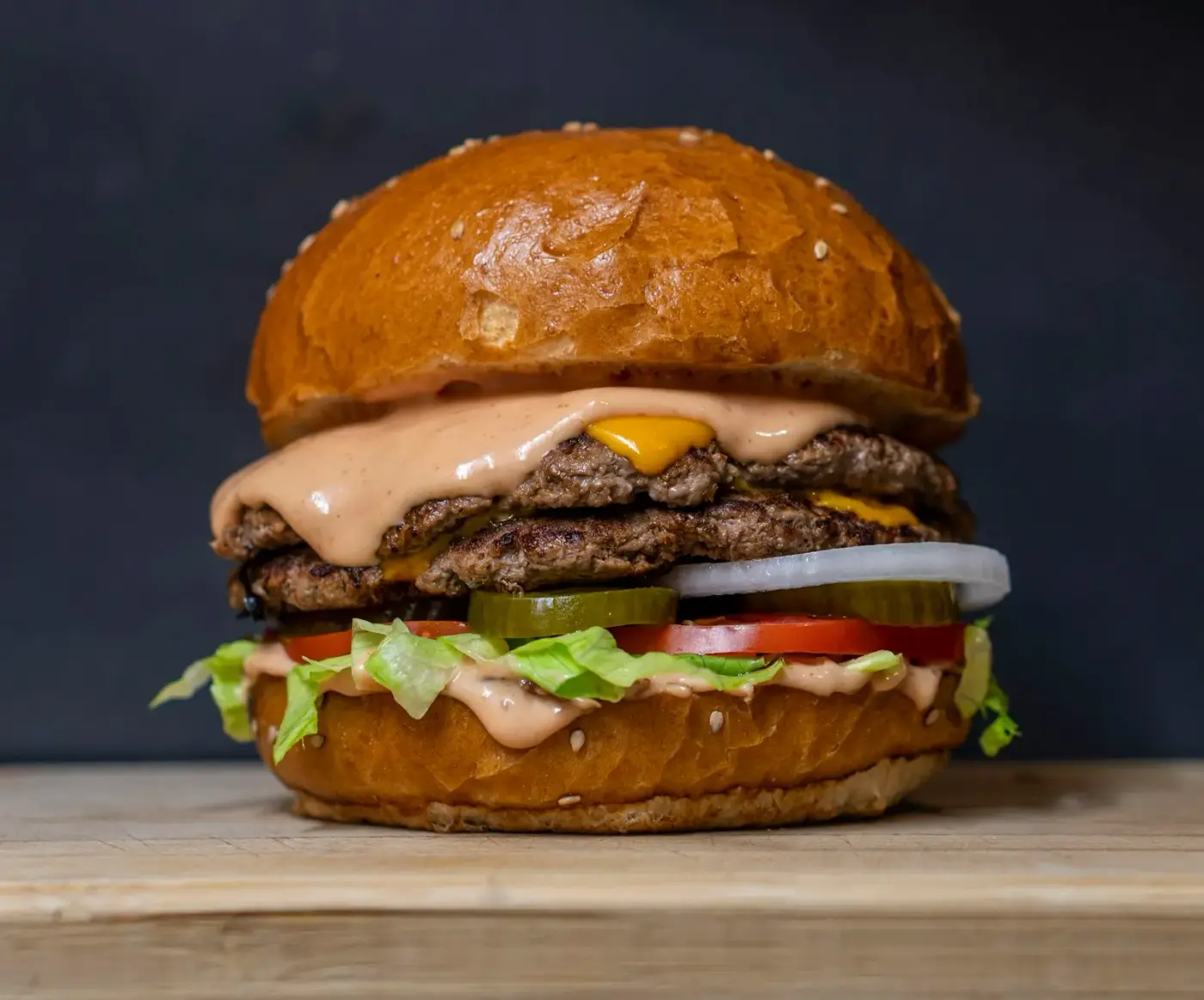 LongHorn kids cheeseburger on a bun with kids meal sides