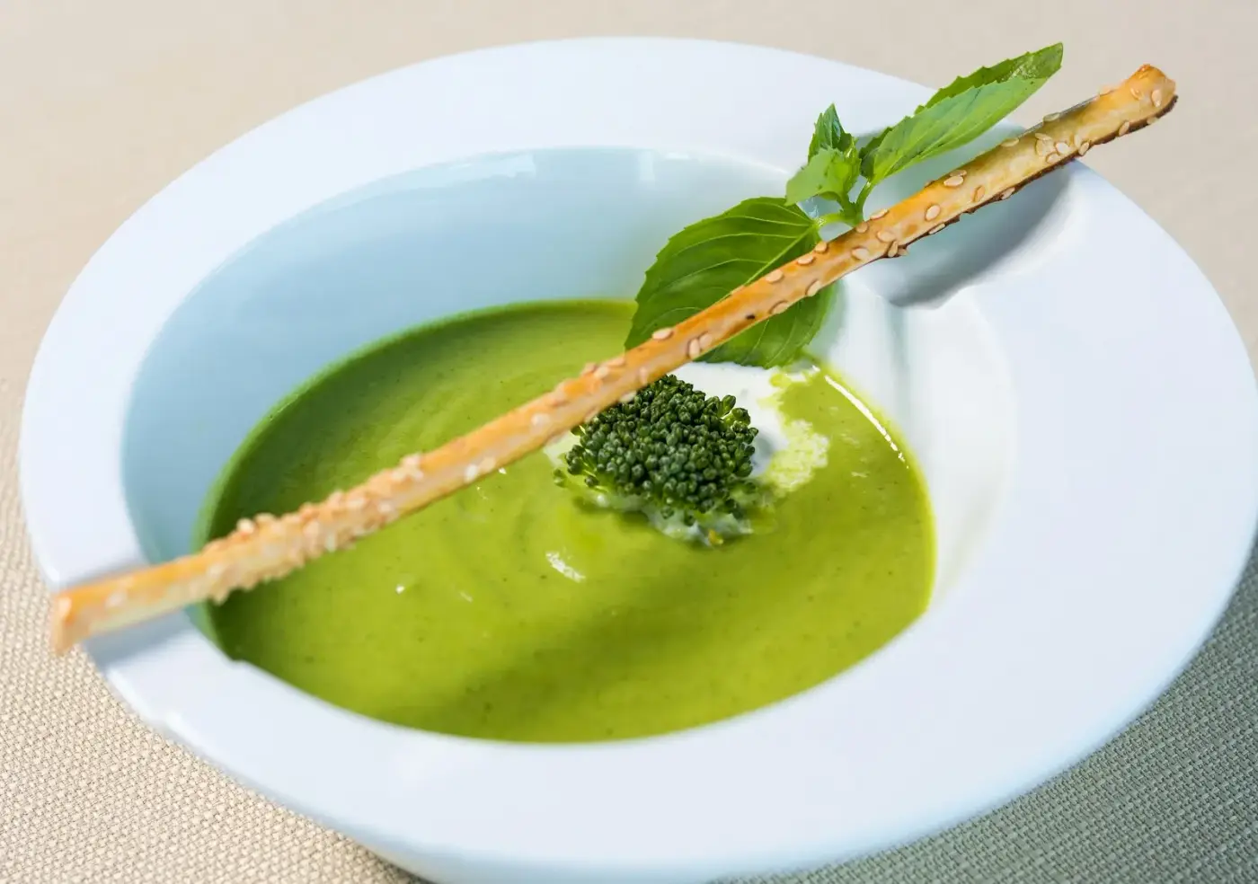 Warm Parmesan Crusted Spinach Dip appetizer with a golden cheese top