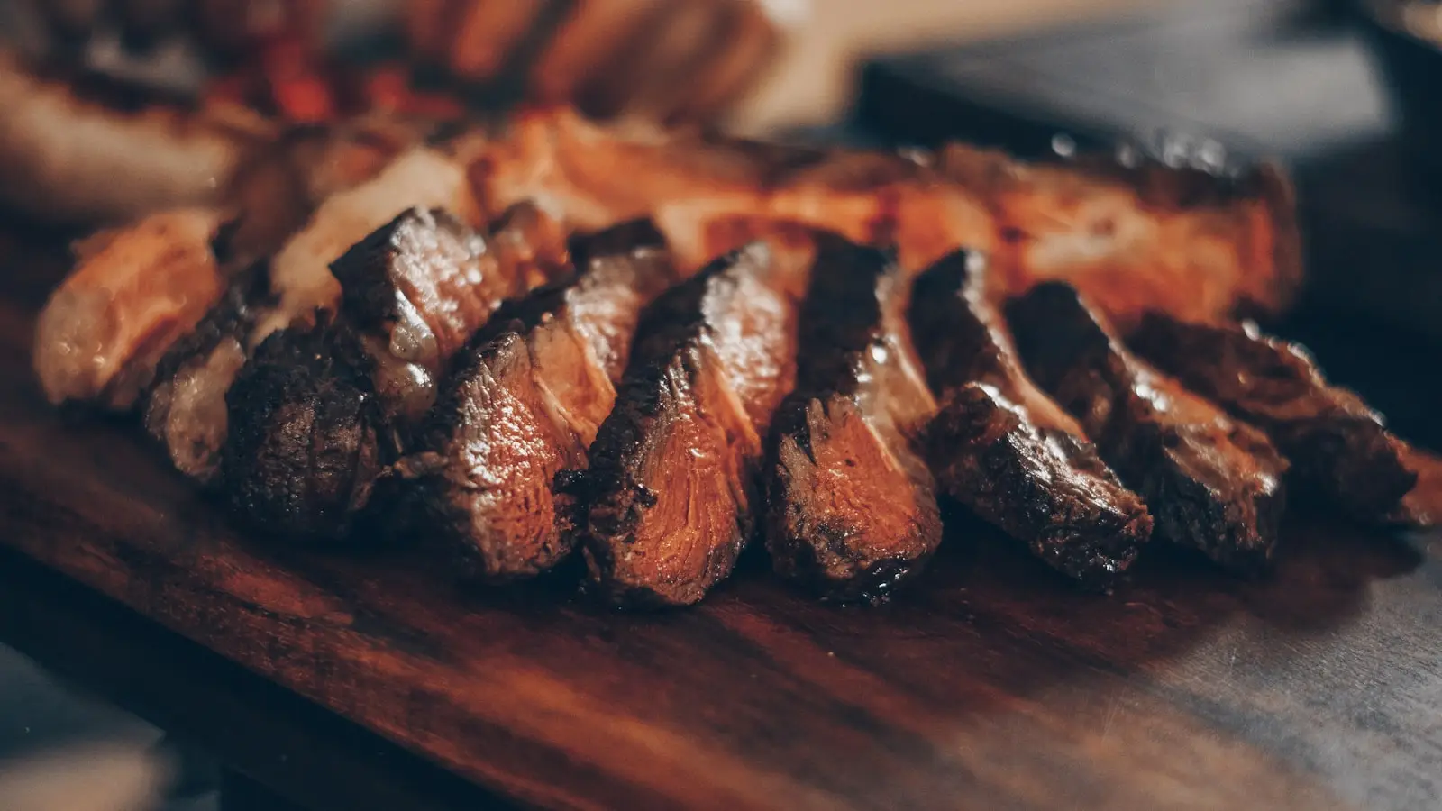 Fire-grilled LongHorn steak sliced and served steakhouse style